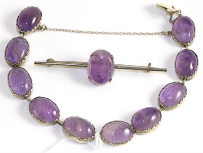 Lot 244 - Amethyst bracelet and amethyst brooch