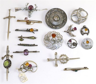 Lot 252 - A Charles Horner style brooch together with a group of various Scottish brooches and pins