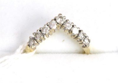 Lot 255 - An 18ct gold diamond wishbone ring, total estimated diamond weight 0.45 carat approximately, finger