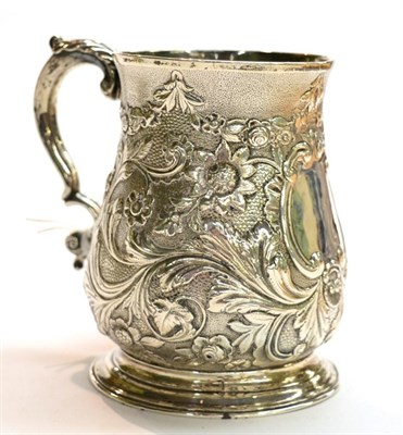 Lot 267 - A George II silver baluster tankard, London, 1743, later repousse decoration, 10.5cm in height