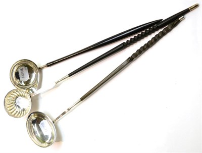 Lot 272 - Three 18th/19th Century silver toddy ladles with whale bone handles (3)