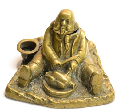 Lot 275 - A 19th Century brass figural 'Fattest Man' inkwell, 17cm in diameter