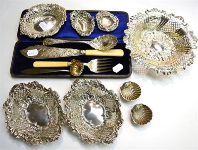 Lot 283 - Miscellaneous silver including six pierced dishes; pair of shell salts; cased fish servers etc....