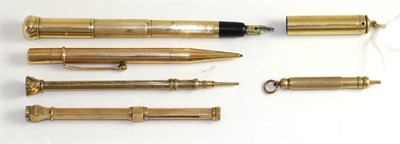 Lot 314 - A 9ct gold propelling pencil, a fountain pen and three other propelling pencils