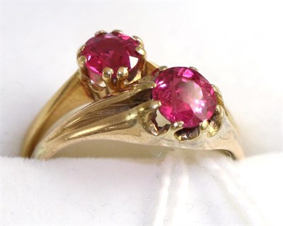 Lot 315 - Two synthetic ruby rings, both finger size N