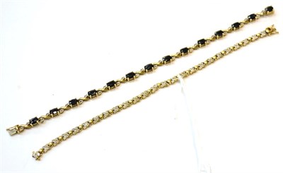 Lot 318 - A 9ct gold sapphire and diamond line bracelet, and a 9ct gold diamond line bracelet (a.f.) (2)