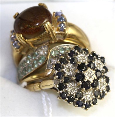 Lot 351 - A 9ct gold opal and tanzanite ring, a 9ct gold sapphire cluster ring and a 9ct gold emerald and...