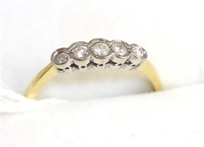 Lot 358 - An 18ct gold diamond five stone ring, 0.20 carat approximately, finger size P