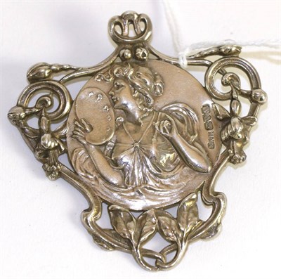 Lot 366 - A silver Art Nouveau brooch, the central circular panel embossed with the allegorical figure of...