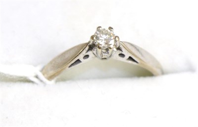 Lot 377 - A diamond solitaire ring, 0.15 carat approximately, finger size N1/2, stamped '750'