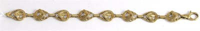 Lot 396 - A 9ct gold horseshoe link bracelet