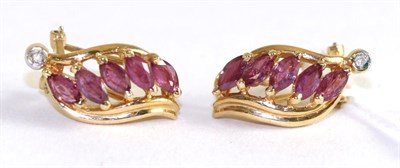 Lot 404 - A pair of 14ct gold ruby and diamond earrings, with French clip fittings