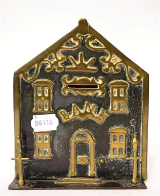 Lot 408 - A Victorian brass mounted metal money bank