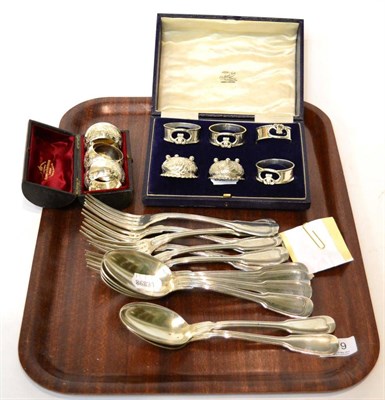 Lot 419 - Six forks and six spoons stamped '84', a cased set of three napkin rings, four silver napkin...