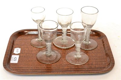 Lot 429 - Five 18th century air twist stem glasses