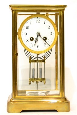 Lot 458 - A brass four glass striking mantel clock