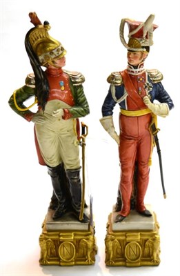 Lot 483 - A pair of Capo di Monte style porcelain figures of Napoleonic soldiers, 20th century, each standing