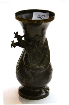 Lot 487 - A Japanese bronze baluster vase with dragon relief design, 18cm in height