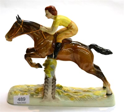 Lot 489 - Beswick pottery figure, girl on horse hurdling fence