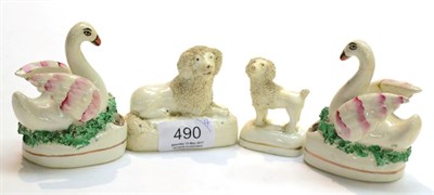 Lot 490 - Pair of 19th century Stafforshire swans, together with two poodles of similar date