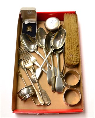 Lot 500 - A group of silver including a pocket watch, napkin rings, flatware, thimble, sugar nips, hand brush