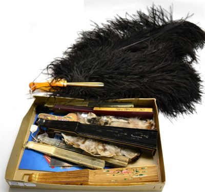 Lot 504 - Two volumes on Fans, taxidermy bird and leather fan, an ebonised fan with painted fabric mount,...