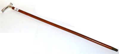 Lot 509 - A Chinese white metal handled cane, with character marks