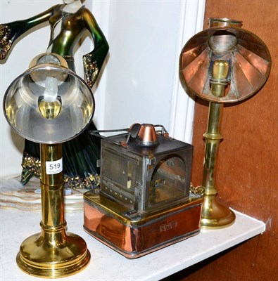 Lot 519 - A British railway lantern and two brass lamps