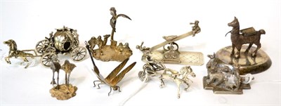 Lot 536 - A collection of eight white metal miniature figures including pumpkin coach and horse, llama,...