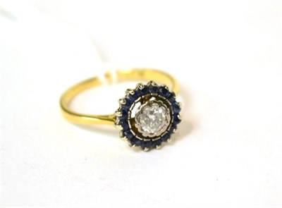 Lot 540 - A sapphire and old cut diamond cluster ring, estimated diamond weight 0.25 carat approximately,...