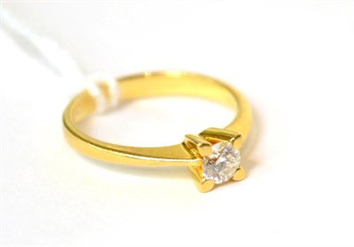 Lot 546 - A diamond solitaire ring, 0.25 carat approximately, finger size K stamped '750'