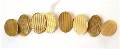 Lot 556 - Two pairs of 9ct gold double oval cufflinks