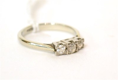 Lot 580 - A diamond three stone ring, 0.35 carat approximately, finger size L