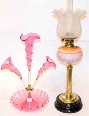 Lot 597 - Cranberry epergne, oil lamp and shade