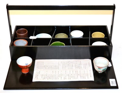 Lot 598 - Japanese lacquer box of ten signed specimen tea bowls