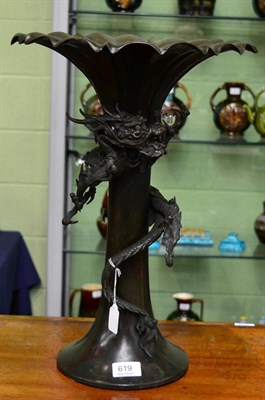 Lot 619 - A Japanese Meiji period bronze vase with everted rim and decorated with applied dragon holding...