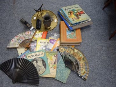 Lot 1062 - A group of books, relating to Royalty and French fables etc, three fans etc