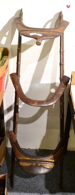 Lot 1102 - A Middle Eastern saddle rack&nbsp