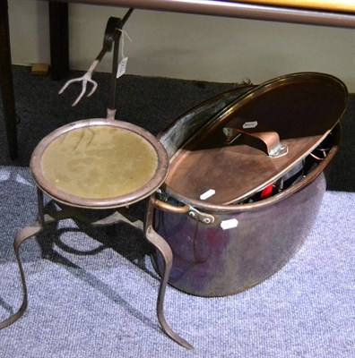 Lot 1122 - A 19th century copper twin handled pan together with metal wares including bronze pestle and...