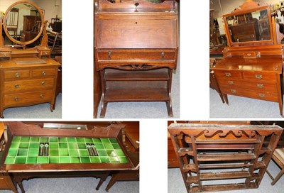 Lot 1179 - A 19th century mahogany fold over tea table, Georgian oak rack, Arts & Crafts bureau, two...