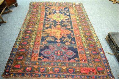 Lot 1196 - A late 19th/early 20th Karabagh rug, South Caucasus, the indigo field with a column of...