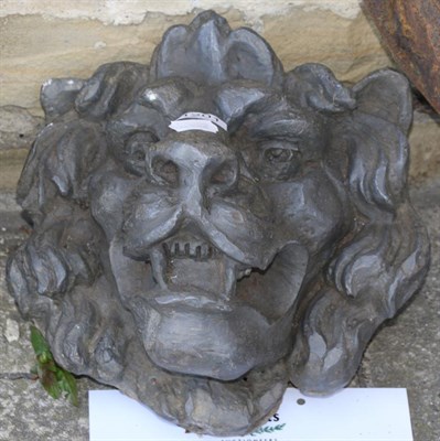 Lot 1201 - A lead lion mask garden ornament