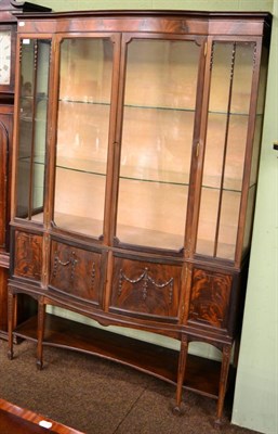 Lot 1206 - An Edwardian glazed mahogany bow fronted display cabinet