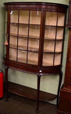 Lot 1210 - A mahogany bow fronted display cabinet