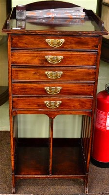 Lot 1211 - A mahogany music cabinet