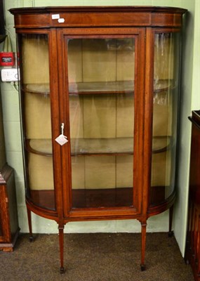 Lot 1212 - An Edwardian feather banded mahogany bow fronted display cabinet