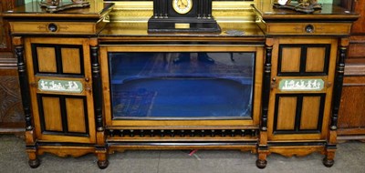 Lot 1214 - A Victorian Aesthetic influence sideboard, part ebonised, the central glazed display cabinet...