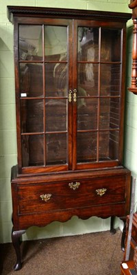 Lot 1220 - A 19th century mahogany glazed bookcase on stand