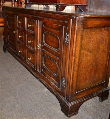 Lot 1231 - A reproduction oak sideboard