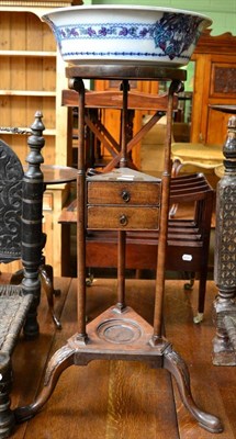 Lot 1245 - A George III mahogany washstand and bowl